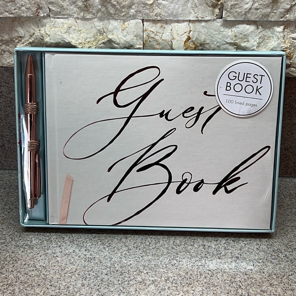 Brand new guest book with 100 lined pages with Rose, gold, lettering, and pen